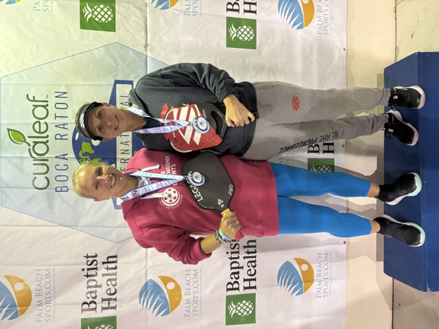 Heather Lovett on the podium with her medal and partner at the Curaleaf Boca Raton tournament